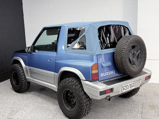 SUZUKI VITARA SOFT TOP BLUE W/ DARK TINT WINDOWS OZTOPZ