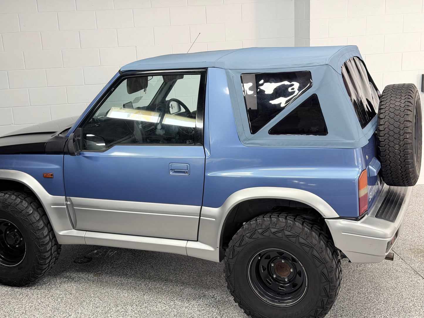 SUZUKI VITARA SOFT TOP BLUE W/ DARK TINT WINDOWS OZTOPZ